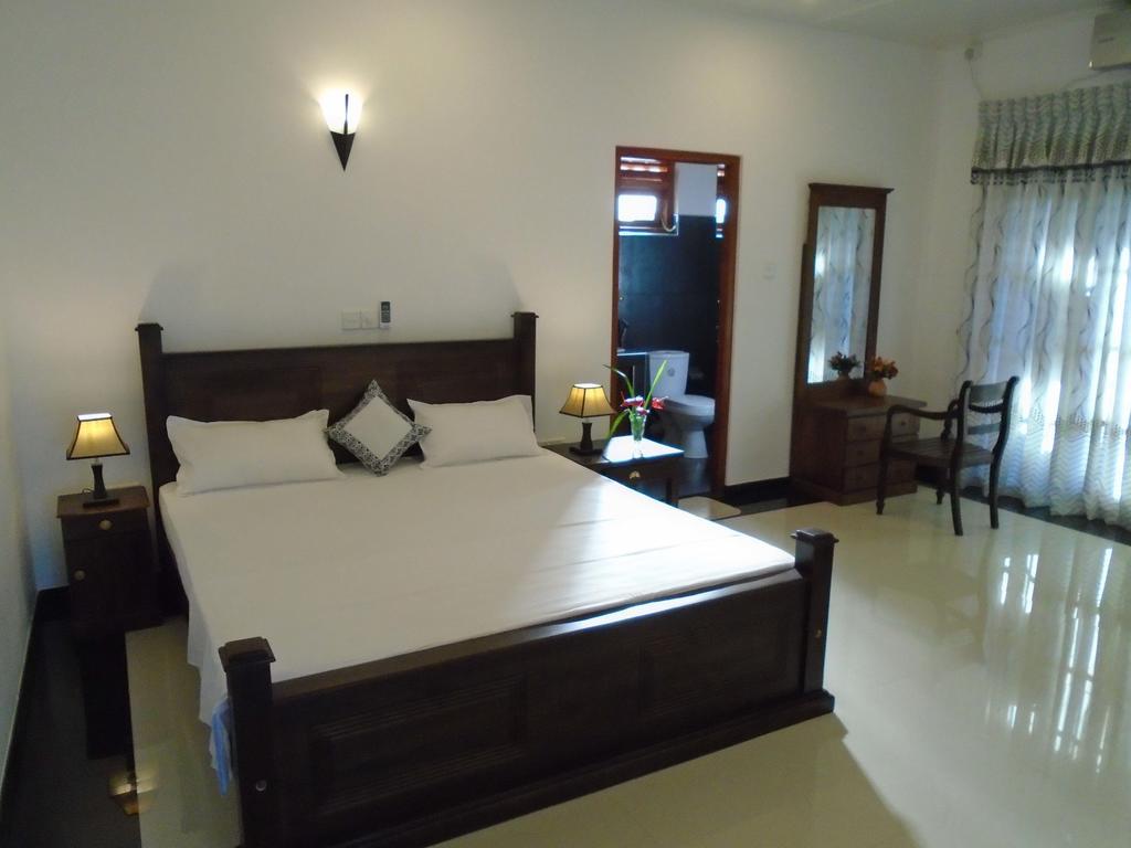 Avon Villa Hikkaduwa Pokoj fotografie